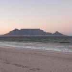 Scenic view of Table Mountain at sunset from Bloubergstrand Beach, Cape Town.