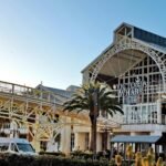 Exterior view of the iconic Victoria Wharf Shopping Center in Cape Town, South Africa.